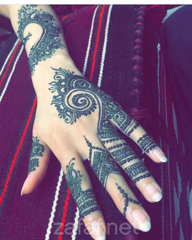 الحناية تومي